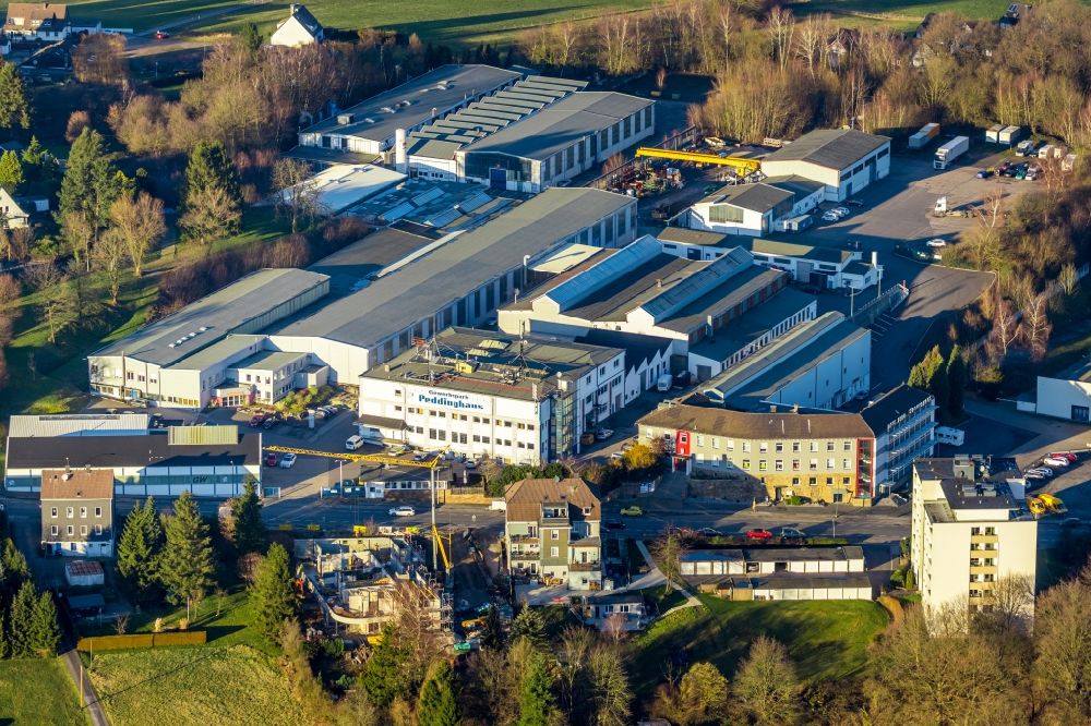 Aerial image Gevelsberg - Building and production halls on the premises of TS Gesellschaft fuer Transport- and Sicherungssysteme mbH on Hasslinghauser Strasse overlooking a construction site in Gevelsberg in the state North Rhine-Westphalia, Germany