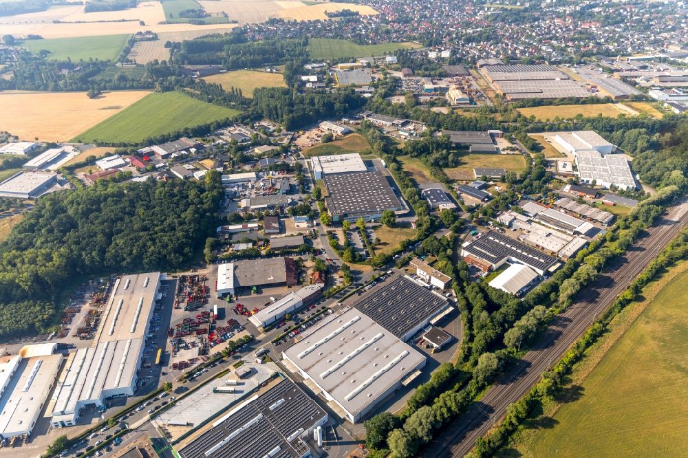 Ahlen from the bird's eye view: Building and production halls on the premises of LR Health & Beauty Systems GmbH on Porschestrasse in Ahlen in the state North Rhine-Westphalia, Germany