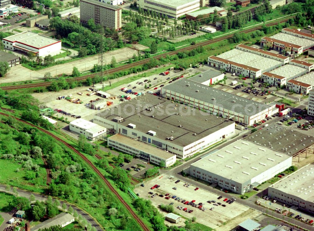 Aerial photograph Berlin - Building and production halls on the premises of HMP Heidenhain Microprint GmbH on street Rhinstrasse in the district Marzahn in Berlin, Germany