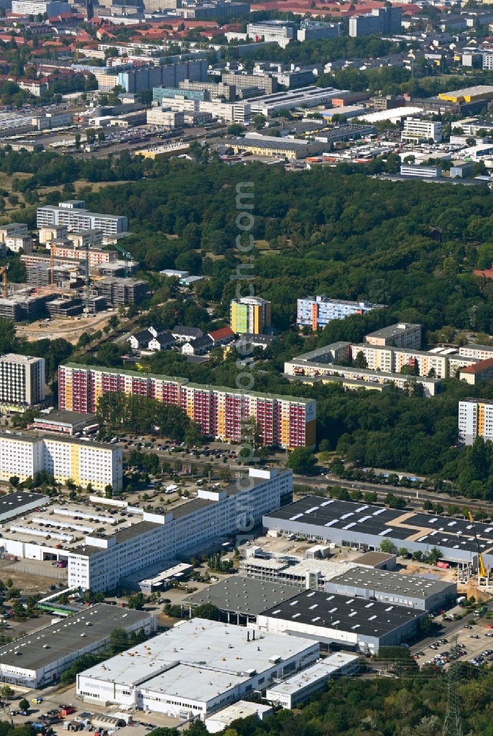 Berlin from the bird's eye view: Building and production halls on the premises of HMP Heidenhain Microprint GmbH on street Rhinstrasse in the district Marzahn in Berlin, Germany