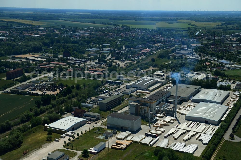 Lübz from the bird's eye view: Building and production halls on the premises IsoVer on Industriestrasse in Luebz in the state Mecklenburg - Western Pomerania, Germany