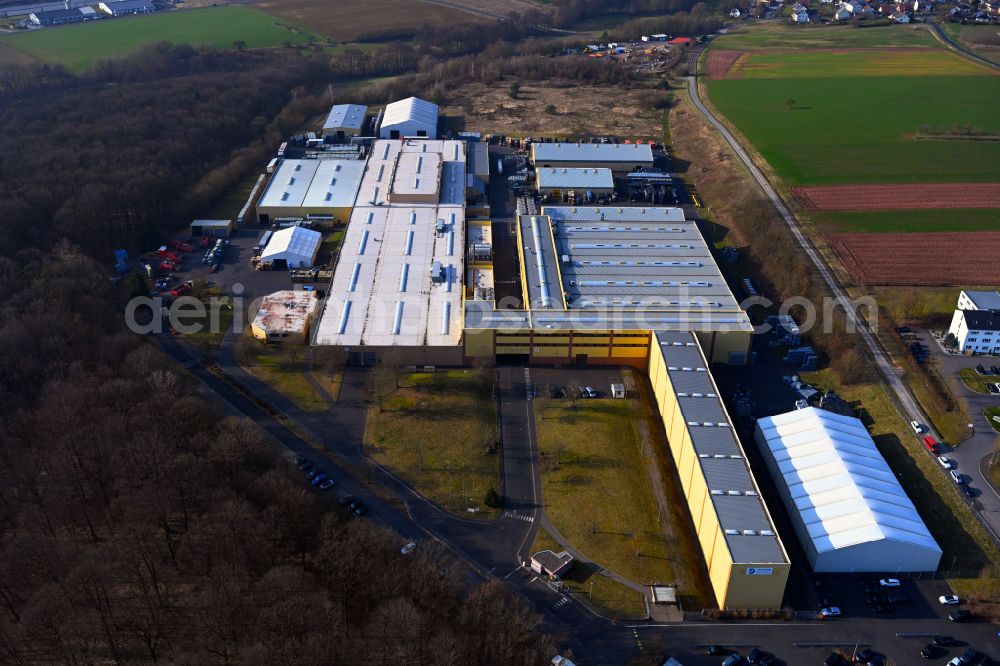 Albertshausen from the bird's eye view: Building and production halls on the premises of Joyson PlasTec GmbH on street Haeuserschlag in Albertshausen in the state Bavaria, Germany