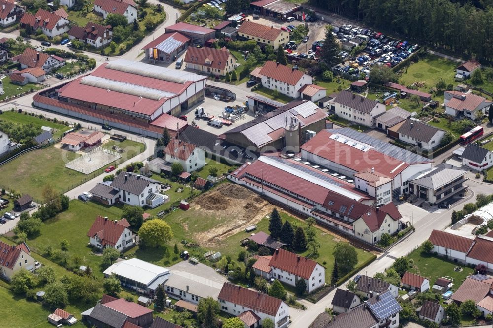 Balzhausen from the bird's eye view: Building and production halls on the premises of Kalchschmid GmbH & Co. KG on Pfarrer-Rost-Strasse in Balzhausen in the state Bavaria, Germany