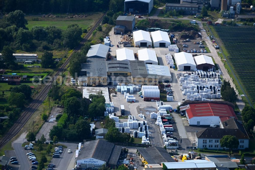 Klosterfelde from the bird's eye view: Building and production halls on the premises of Karibu Holztechnik on street Beusterstrasse in Klosterfelde in the state Brandenburg, Germany