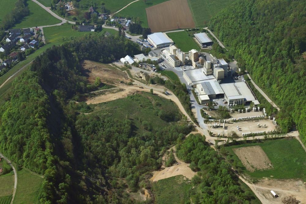 Bollschweil from above - Building and production halls on the premises of Knauf Marmorit GmbH in Bollschweil in the state Baden-Wurttemberg, Germany