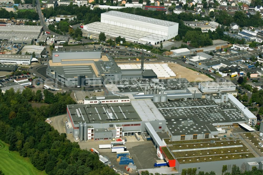 Bergisch Gladbach from the bird's eye view: Building and production halls on the premises of KRUeGER GmbH & Co. KG in the district Bensberg in Bergisch Gladbach in the state North Rhine-Westphalia, Germany