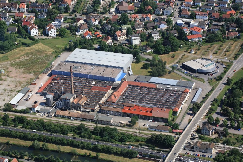 Aerial photograph Lörrach - Buildings and production halls on the factory premises of Lauffenmuehle GmbH & Co.KG in Loerrach in Baden -Wuerttemberg. The textile company has not been spared by the textile crisis