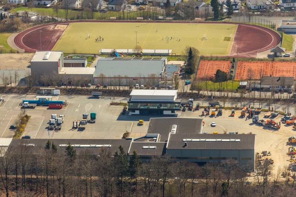 Aerial image Schmallenberg - Factory premises of the Maschinen + Technik Sauerland Verwaltungs GmbH and sports grounds in Schmallenberg in the federal state of North Rhine-Westphalia, Germany
