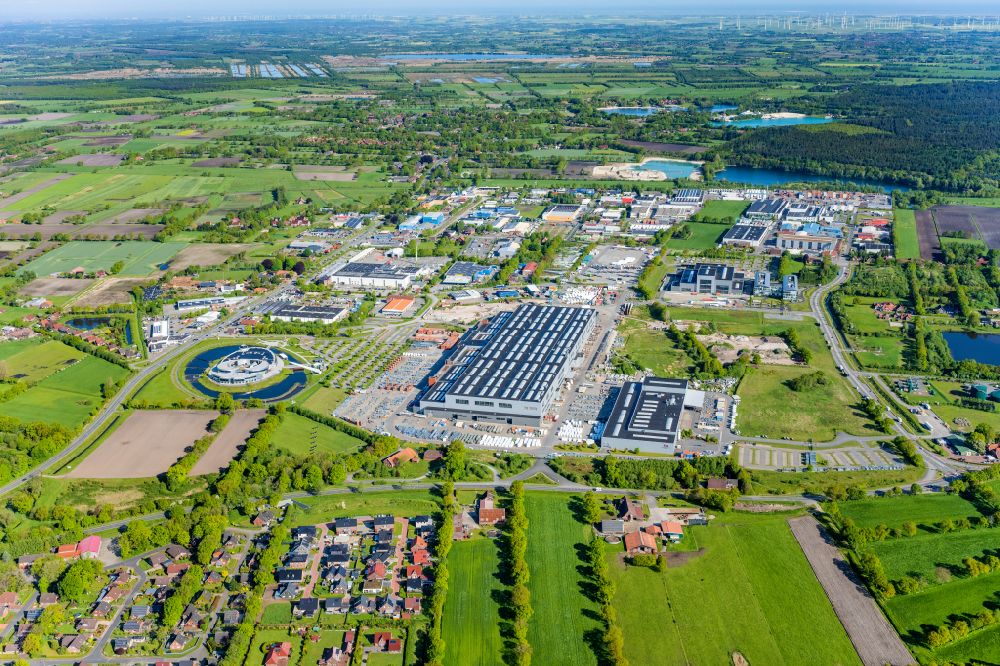 Aurich from the bird's eye view: Building and production halls on the premises of Mechanic Anlagenbau GmbH on street Abelweg - Borsigstrasse in the district Sandhorst in Aurich in the state Lower Saxony, Germany