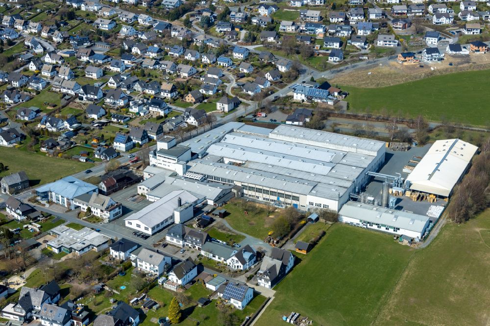 Eversberg from above - Building and production halls on the factory premises of MOeLLER GmbH & Co. KG in Eversberg in the Sauerland in the state of North Rhine-Westphalia, Germany