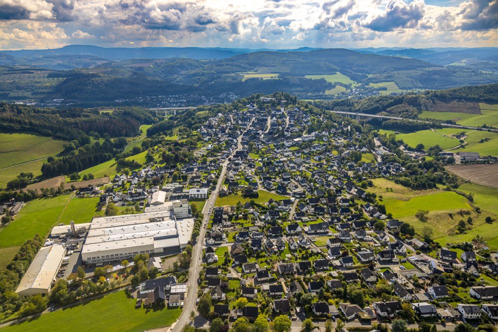 Eversberg from above - Building and production halls on the factory premises of MOeLLER GmbH & Co. KG in Eversberg in the Sauerland in the state of North Rhine-Westphalia, Germany