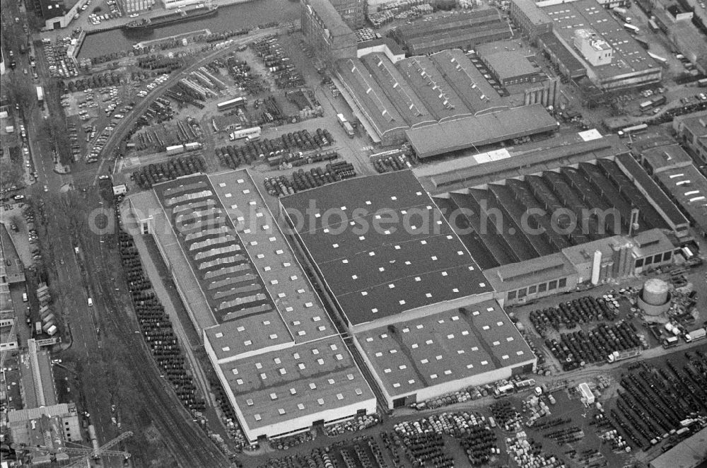 Berlin from the bird's eye view: Building and production halls on the premises Norddeutsche Kabelwerke AG in the district Neukoelln in Berlin, Germany