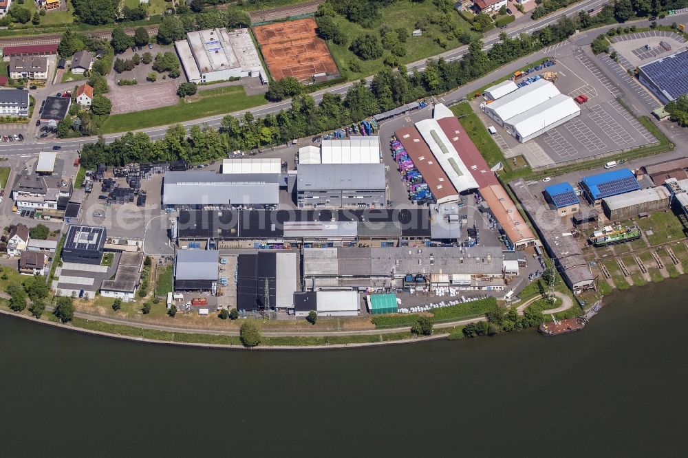 Aerial image Neckarsteinach - Building and production halls on the premises of Odenwald-Chemie GmbH on Hirschhorner Strasse in Neckarsteinach in the state Hesse, Germany