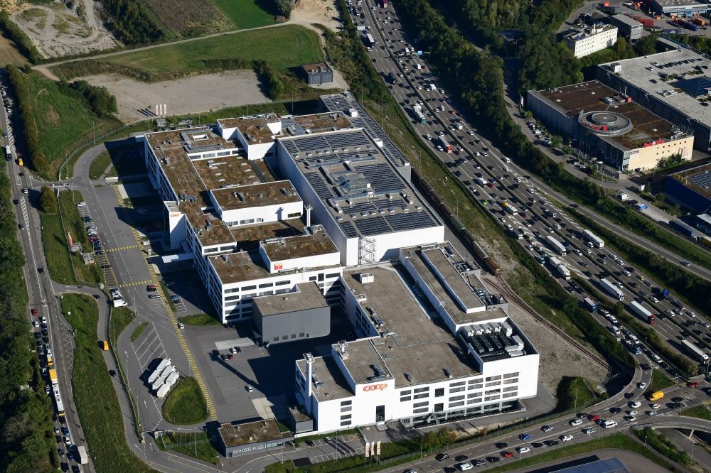 Aerial photograph Pratteln - Building and production halls on the premises of the production plant of Coop in Pratteln in the canton Basel-Landschaft, Switzerland
