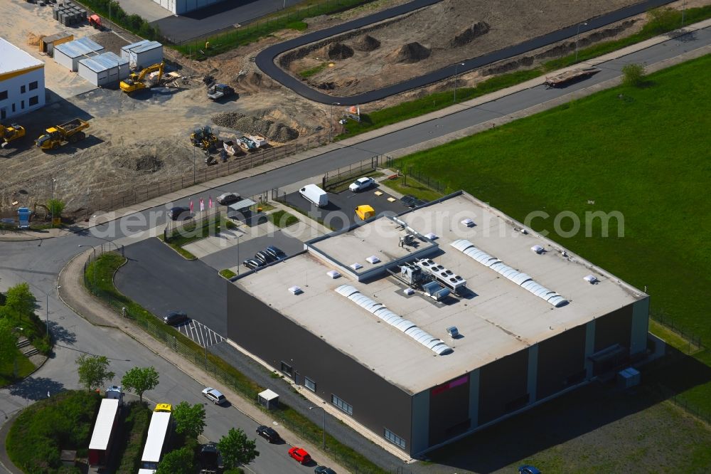 Radeburg from the bird's eye view: Building on the factory premises of the cleaning company CWS Cleanrooms in Radeburg in the state Saxony, Germany