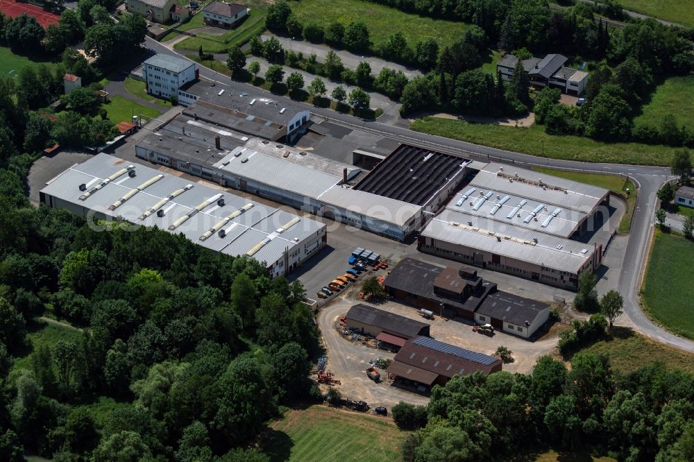 Aerial image Münnerstadt - Building and production halls on the premises of REMOG - Rudolf-Erich Mueller GmbH & Co KG in Muennerstadt in the state Bavaria, Germany