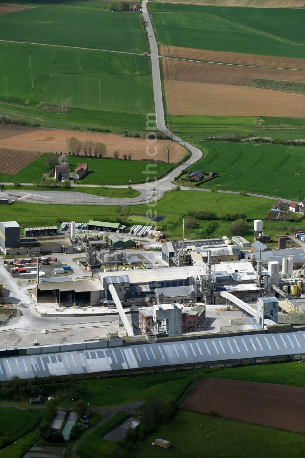 Aerial image Frasnes-lez-Anvaing - Building and production halls on the premises of Rosier in Frasnes-lez-Anvaing in Region wallonne, Belgium