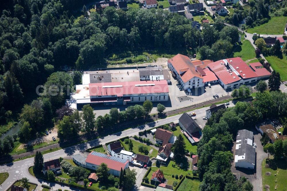 Sigmaringendorf from above - Building and production halls on the premises Schaal Oberflaechensysteme GmbH & Co. KG along Laucherthaler Strasse in Sigmaringendorf in the state Baden-Wuerttemberg, Germany