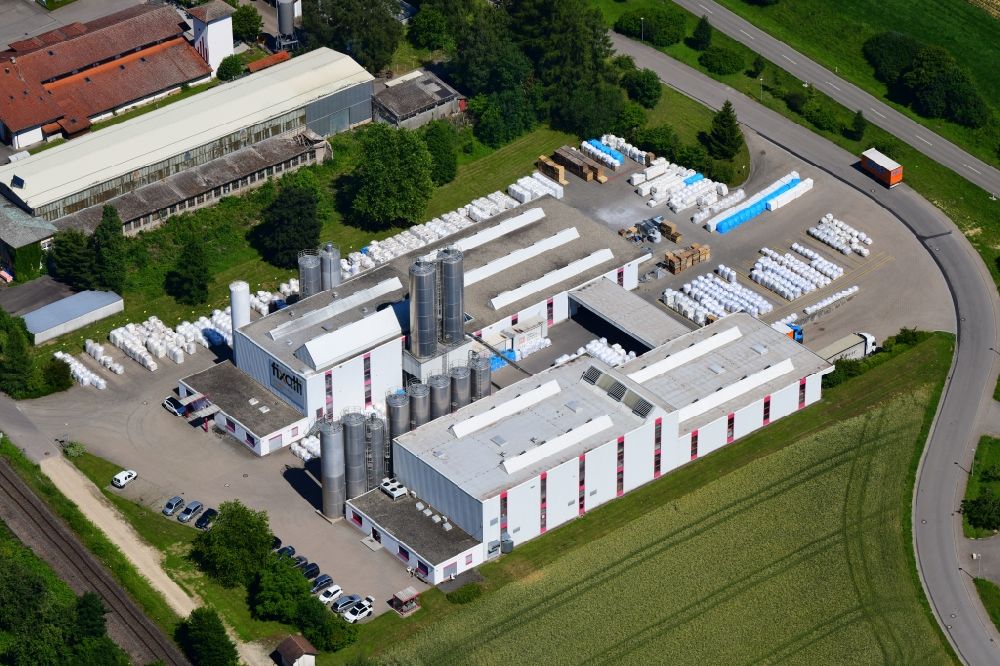 Aerial photograph Grießen - Building and production halls on the premises of Schaetti GmbH Kunststoff-mahl- factory on Industriestrasse in Griessen in the state Baden-Wuerttemberg, Germany