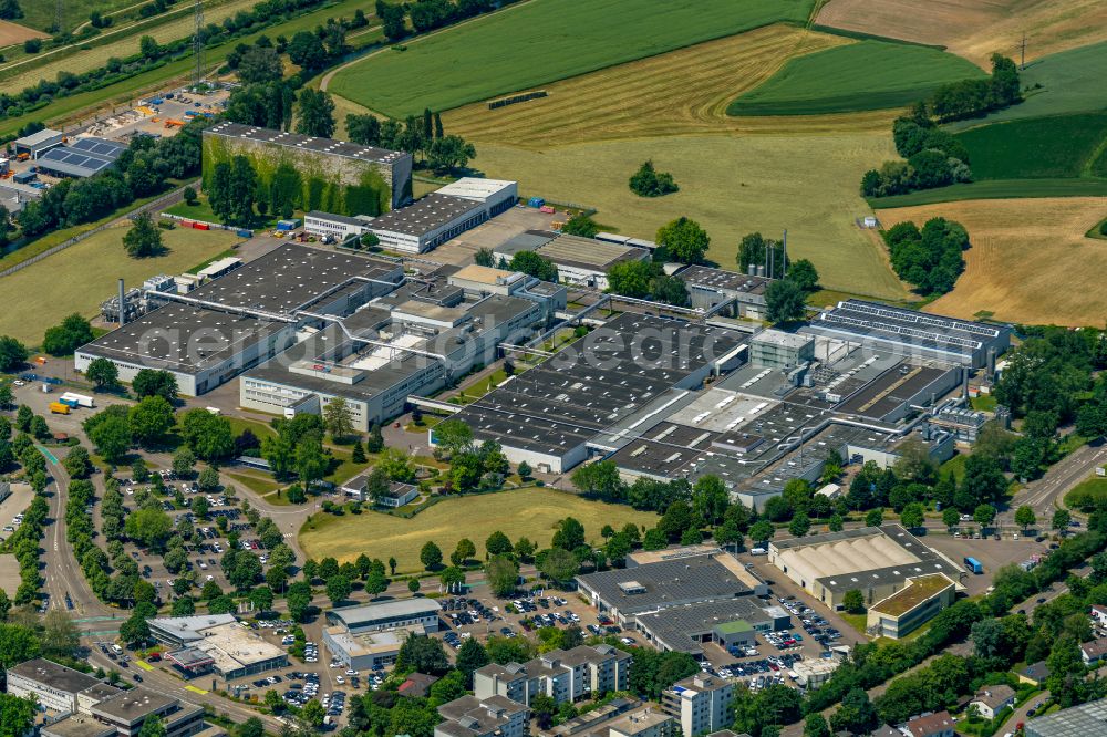 Aerial photograph Offenburg - Building and production halls on the premises of Tesa plant Offenburg GmbH on Kinzigstrasse in Offenburg in the state Baden-Wurttemberg, Germany
