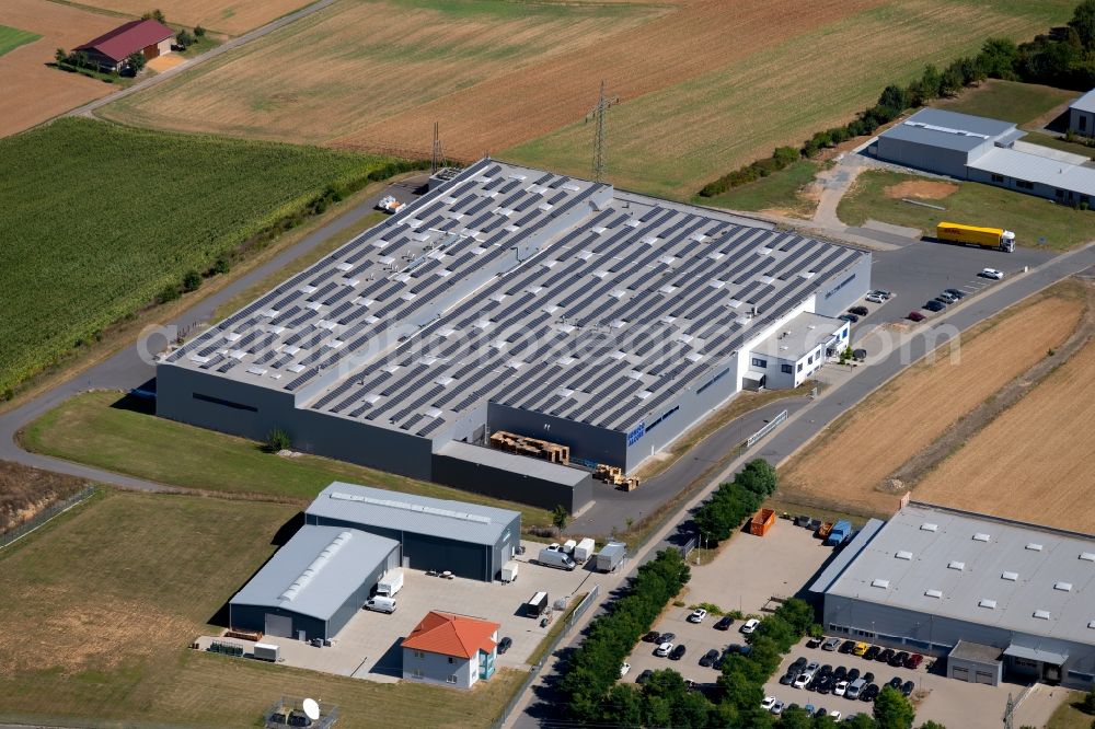 Grünsfeld from the bird's eye view: Building and production halls on the premises of Tubes & Cores, Sonoco Alcore on Waltersberg in Gruensfeld in the state Baden-Wurttemberg, Germany