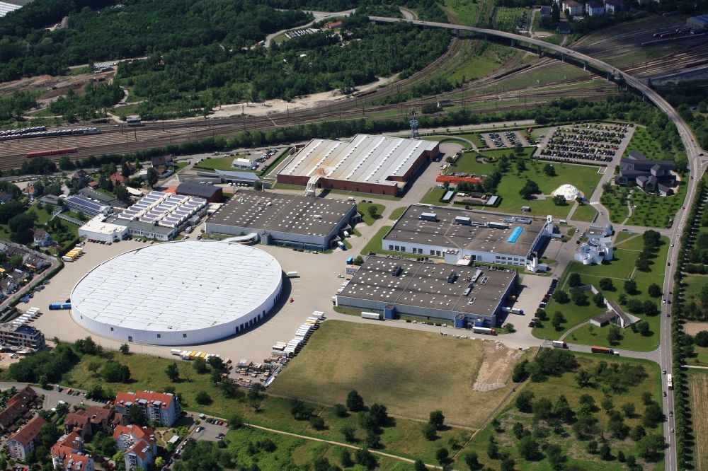 Weil am Rhein from the bird's eye view: Building and production halls on the premises of the furniture manufacturer Vitra in Weil am Rhein in the state of Baden- Wuerttemberg form a unique ensemble of contemporary architecture. The buildings of many renowned architects lure design and architecture lovers and students in the city on the border triangle near Basel