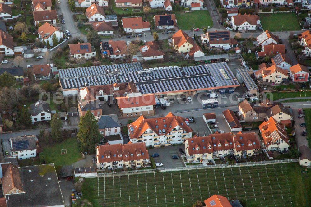 Maikammer from above - Building and production halls on the premises of the vinery Weinkellerei Ludwig Schneider - technischer Betrieb on street Weinstrasse Nord in Maikammer in the state Rhineland-Palatinate, Germany