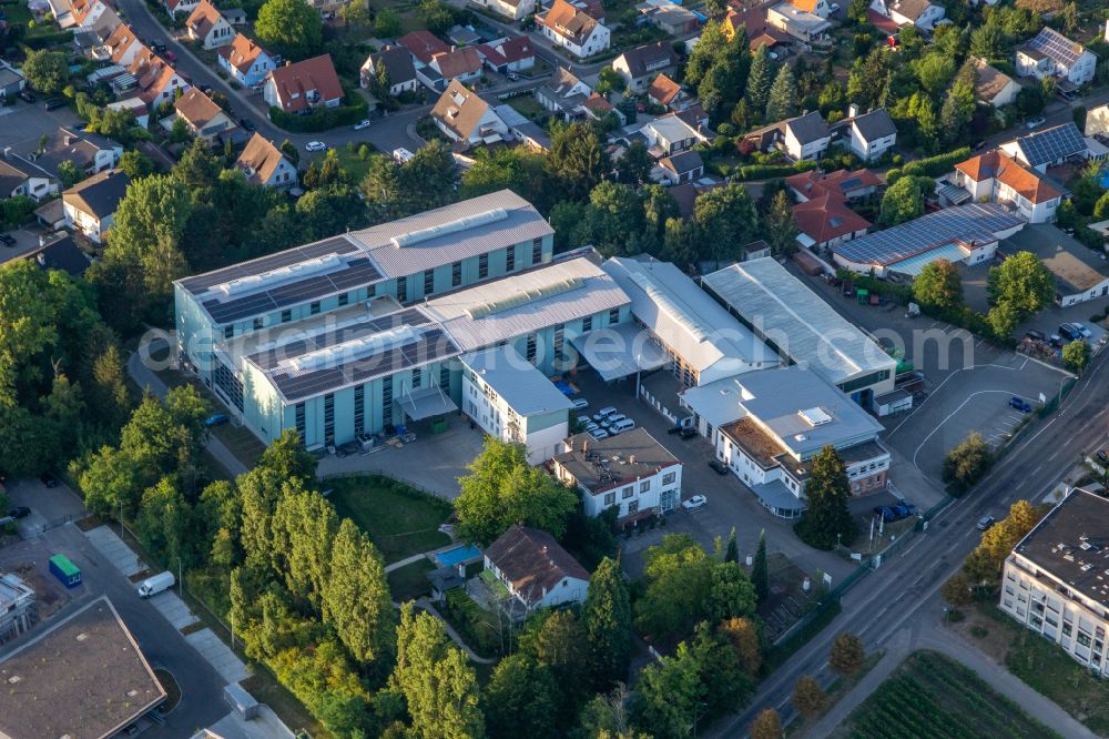 Landau in der Pfalz from the bird's eye view: Building and production halls on the premises of Wickert Maschinenbau GmbH on street Wollmesheimer Hoehe in Landau in der Pfalz in the state Rhineland-Palatinate, Germany