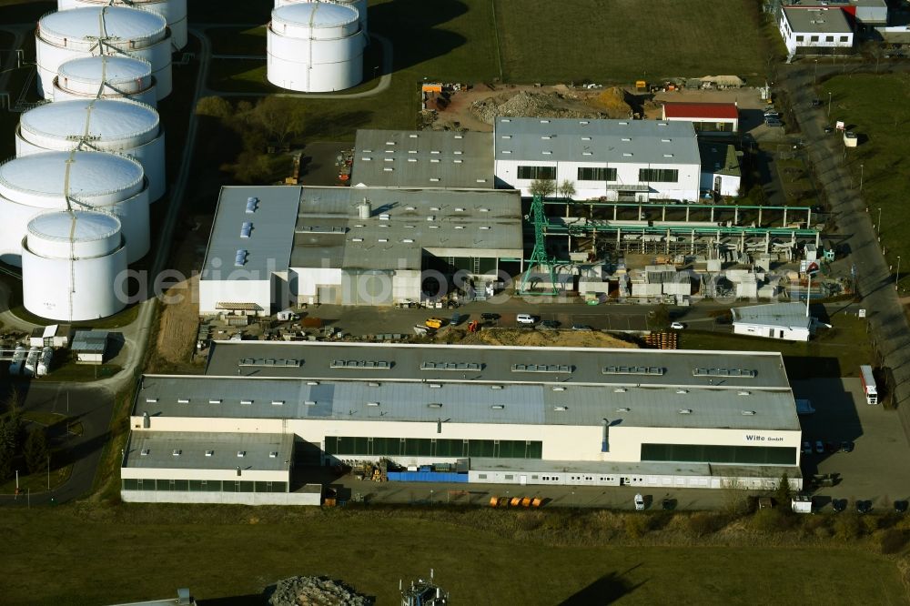 Emleben from the bird's eye view: Buildings and production halls on the site of the engineering company of Witte GmbH Oberflaechentechnik Am Koepfchen in Emleben in the state Thuringia, Germany