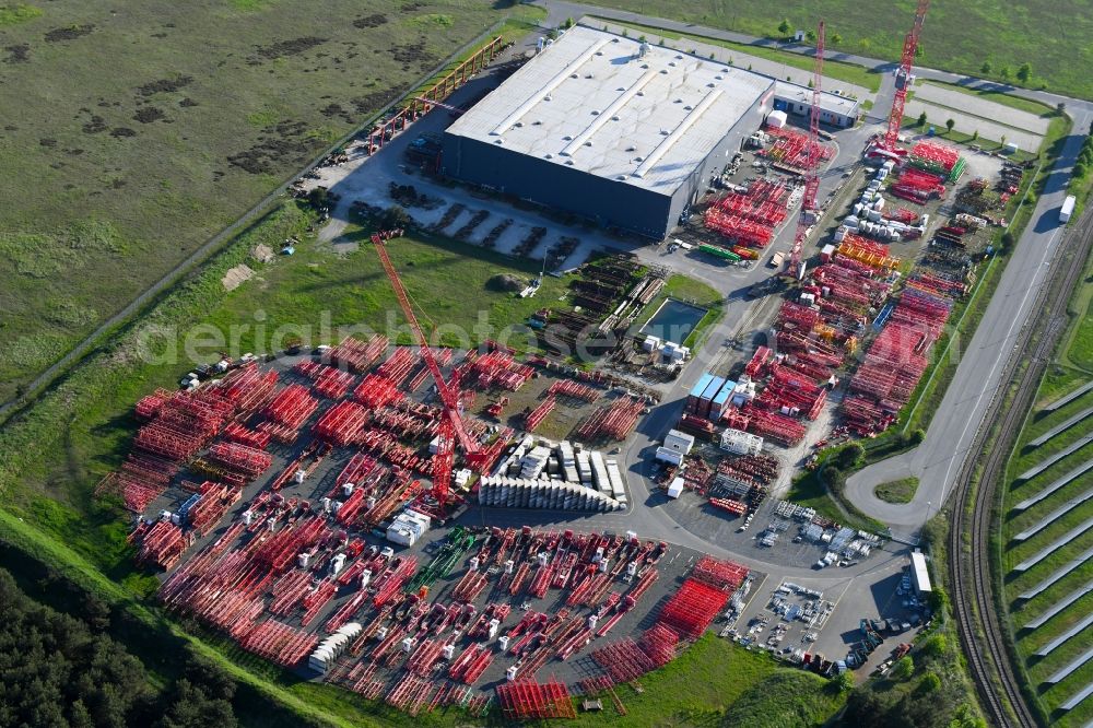Luckau from the bird's eye view: Building and production halls on the premises of WOLFFKRAN GmbH on Frederik-Ipsen-Strasse in Luckau in the state Brandenburg, Germany