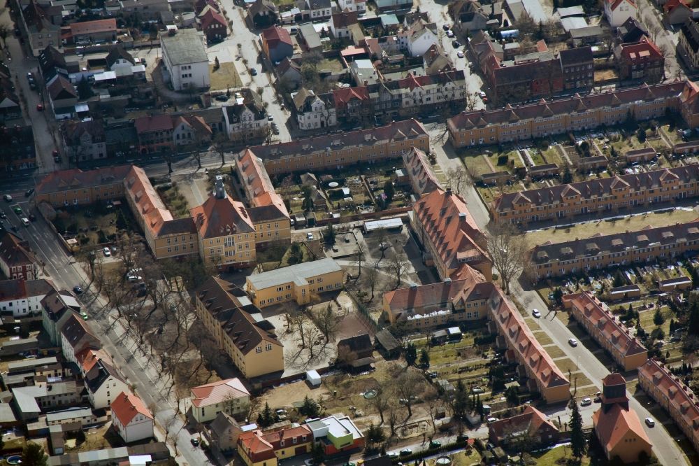 Wittenberg OT Piesteritz from above - The Piesteritzer employee housing is the largest car-free housing development in Germany. From 1916 to 1919, the garden city was built to plans by Paul Schmitthenner and Otto Rudolf Salvisberg for about 2000 employees of the adjacent nitrogen plant. It was recorded in 1986 in the list of monuments of the GDR and has since become a historical monument