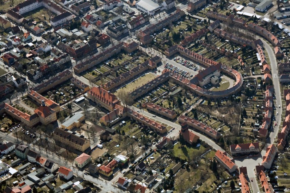 Aerial image Wittenberg OT Piesteritz - The Piesteritzer employee housing is the largest car-free housing development in Germany. From 1916 to 1919, the garden city was built to plans by Paul Schmitthenner and Otto Rudolf Salvisberg for about 2000 employees of the adjacent nitrogen plant. It was recorded in 1986 in the list of monuments of the GDR and has since become a historical monument