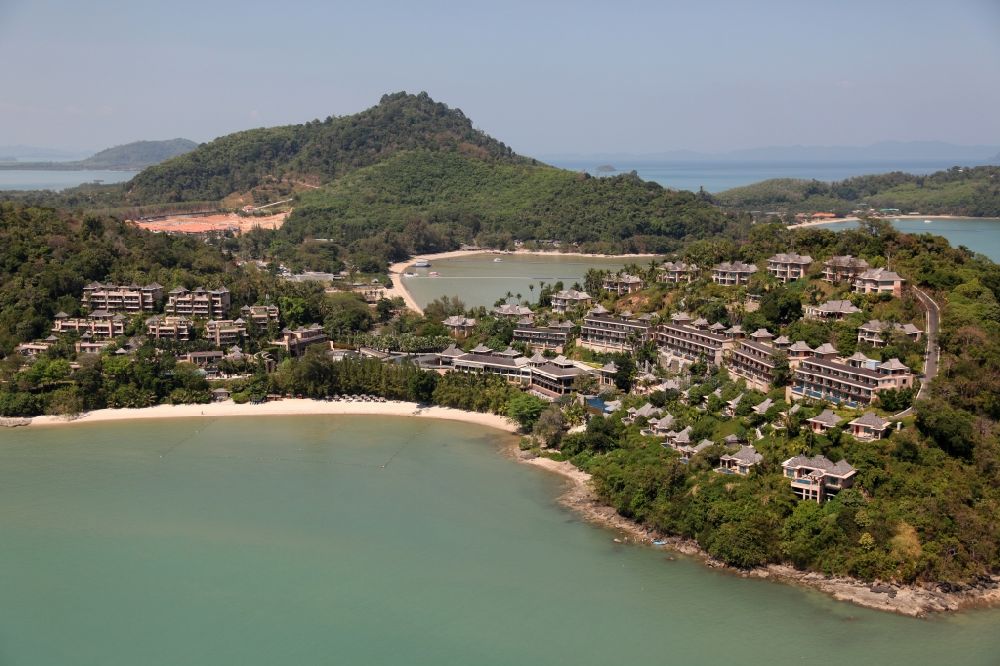 Aerial image Ratsada - The Westin Hotel in Ratsada is located on the island of Phuket in Thailand on the beach and wooded hillsides between palms and overlooking the bay from Phuket Town