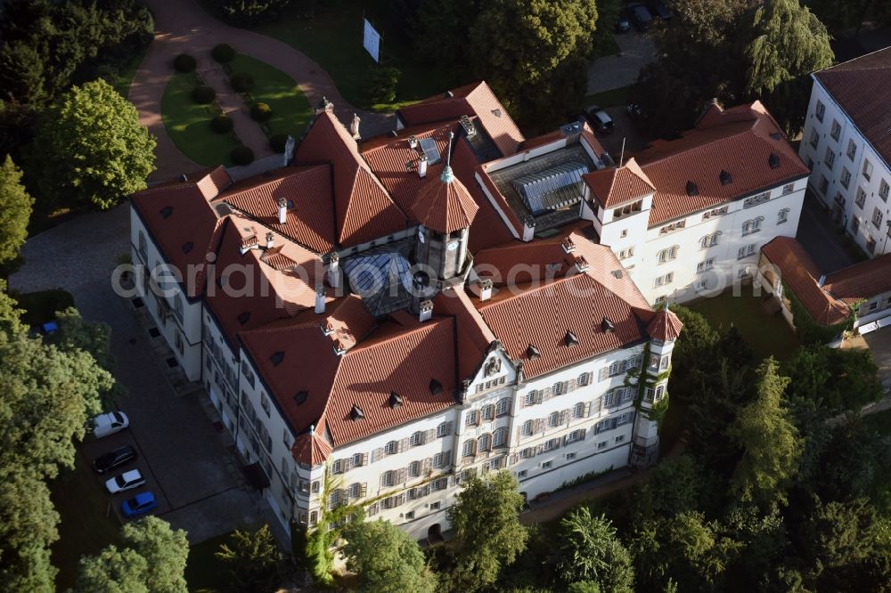 Waldenburg from the bird's eye view: Western part of Castle Waldenburg in Waldenburg in the state of Saxony. The castle with its castle keep is surrounded by forest and located on a hill in the Southeast of Waldenburg