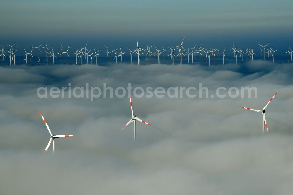 Waltersdorf from above - Weather-induced wind energy installations embedded in a fog layer on a field in Waltersdorf in the state Brandenburg, Germany