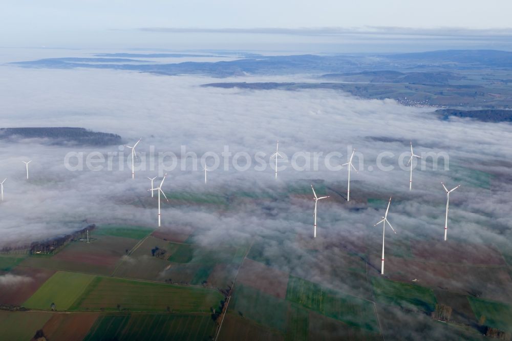 Aerial photograph Krebeck - Weather-induced wind energy installations embedded in a fog layer in Krebeck in the state Lower Saxony, Germany