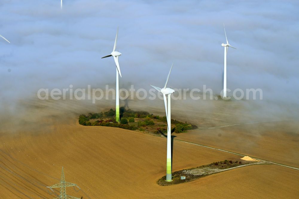 Aerial image Kreiensen - Weather-induced wind energy installations embedded in a fog layer in Kreiensen in the state Lower Saxony, Germany