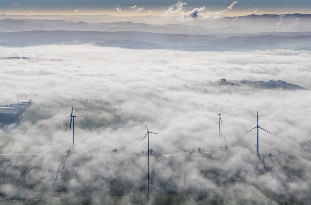 Aerial image Wickede (Ruhr) - Weather-induced wind energy installations embedded in a fog layer in Wickede (Ruhr) in the state North Rhine-Westphalia, Germany