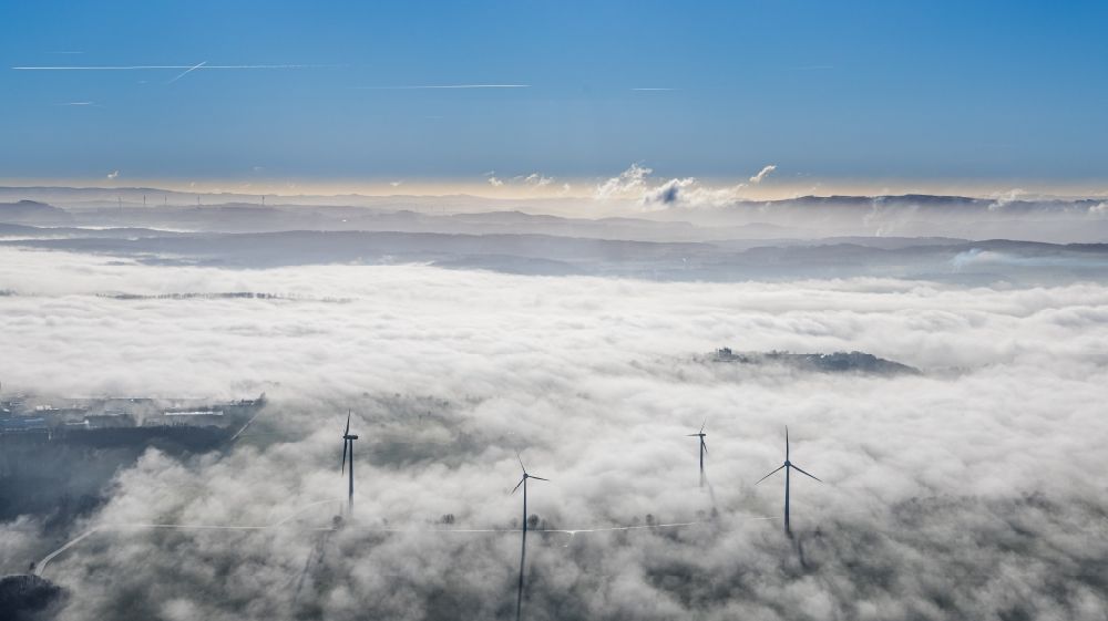 Aerial photograph Wickede (Ruhr) - Weather-induced wind energy installations embedded in a fog layer in Wickede (Ruhr) in the state North Rhine-Westphalia, Germany