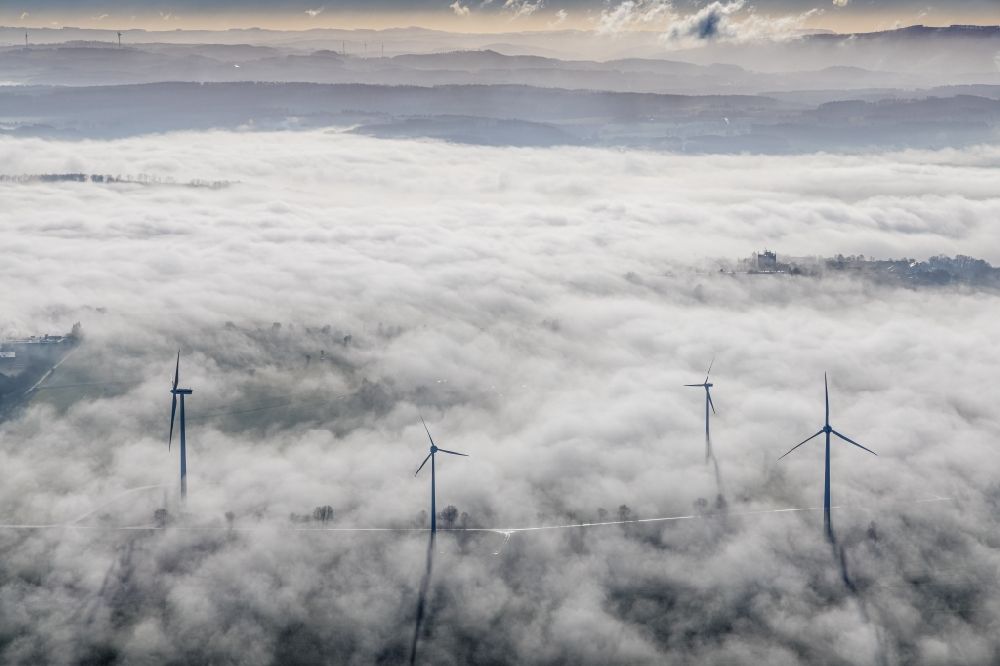 Wickede (Ruhr) from above - Weather-induced wind energy installations embedded in a fog layer in Wickede (Ruhr) in the state North Rhine-Westphalia, Germany