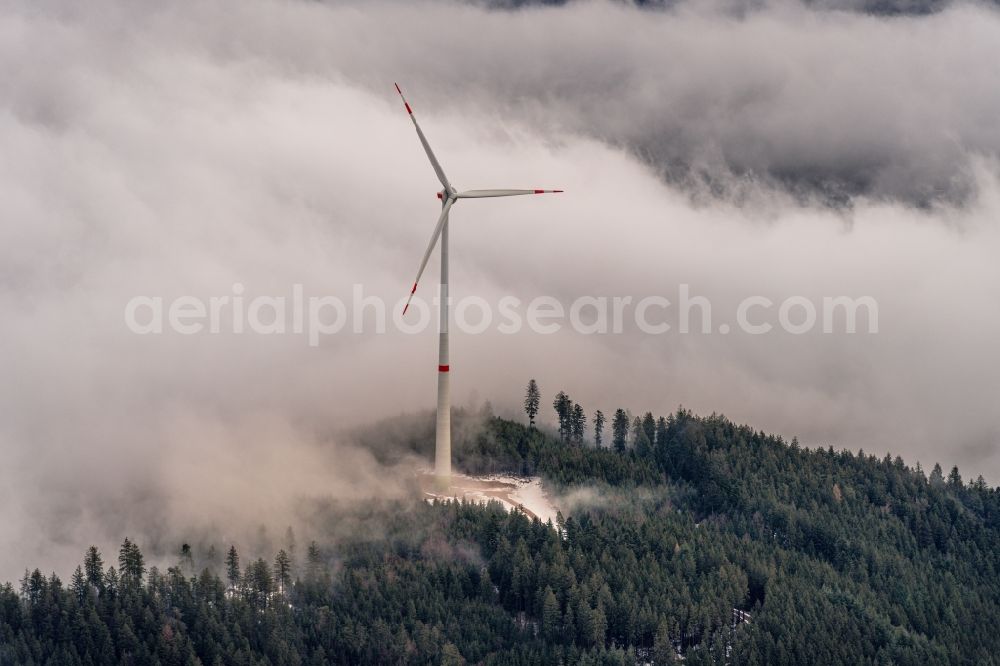 Fischerbach from the bird's eye view: Weather-induced wind energy installations embedded in a fog layer in Fischerbach in the state Baden-Wuerttemberg, Germany