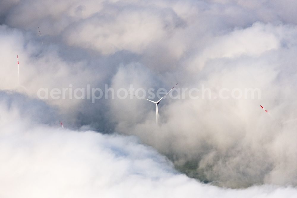 Aerial image Flachslanden - Weather-induced wind energy installations embedded in a clouds layer in Flachslanden in the state Bavaria, Germany