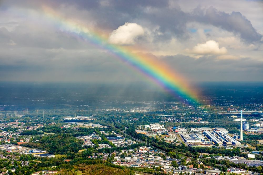 Essen from the bird's eye view: Haze and precipitation conditions with rainbow formation in the district Bergeborbeck in Essen in the state North Rhine-Westphalia, Germany