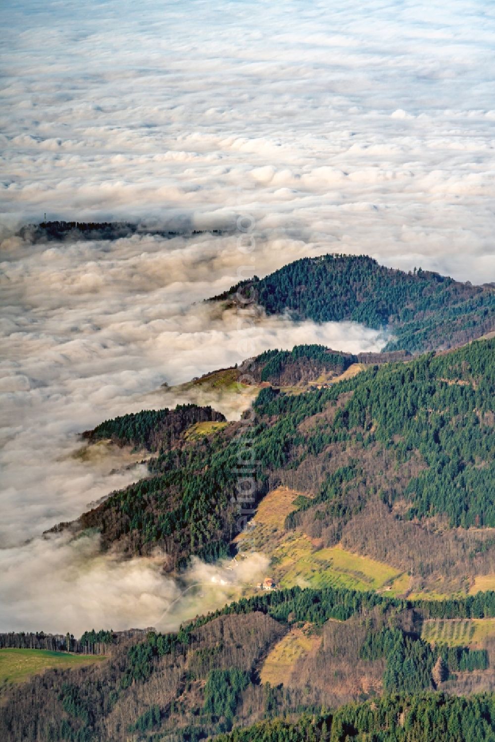 Oberkirch from above - Weather with layered fog cover over the Black Forest in Oberkirch in the state Baden-Wurttemberg, Germany