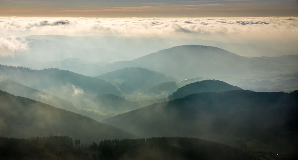 Lengenbeck from above - Weather with layered fog cover over forest areas in Lengenbeck in the state North Rhine-Westphalia, Germany