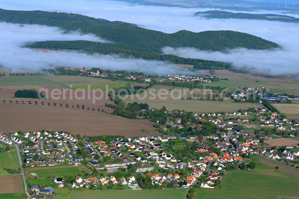 Deensen from the bird's eye view: Weather conditions with cloud formation in Deensen in the state Lower Saxony, Germany