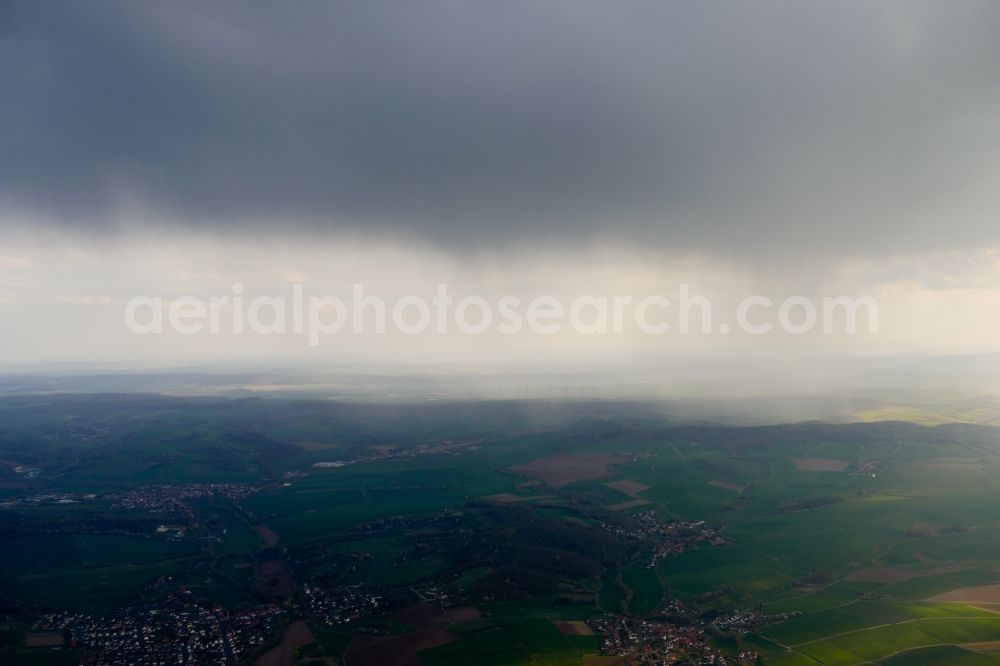 Bremke from above - Weather conditions with cloud formation ond rain in Bremke in the state Lower Saxony, Germany