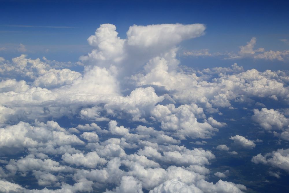 Aerial photograph Badenweiler - Weather conditions with cloud formation over the Black Forest in Germany. Cumulus clouds and thunderclouds are rising into the blue sky