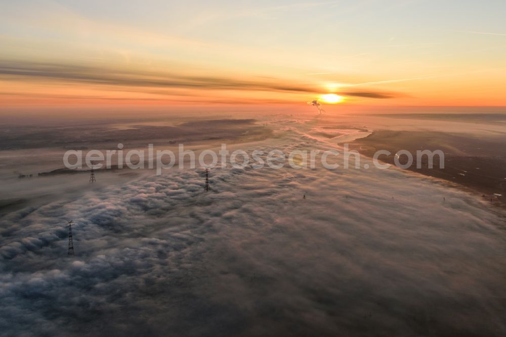 Hollern-Twielenfleth from above - Weather situation with cloud formation and light reflections at sunrise in Hollern-Twielenfleth in the state Lower Saxony, Germany