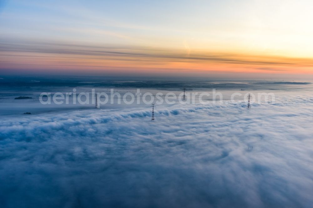 Hollern-Twielenfleth from the bird's eye view: Weather situation with cloud formation and light reflections at sunrise in Hollern-Twielenfleth in the state Lower Saxony, Germany
